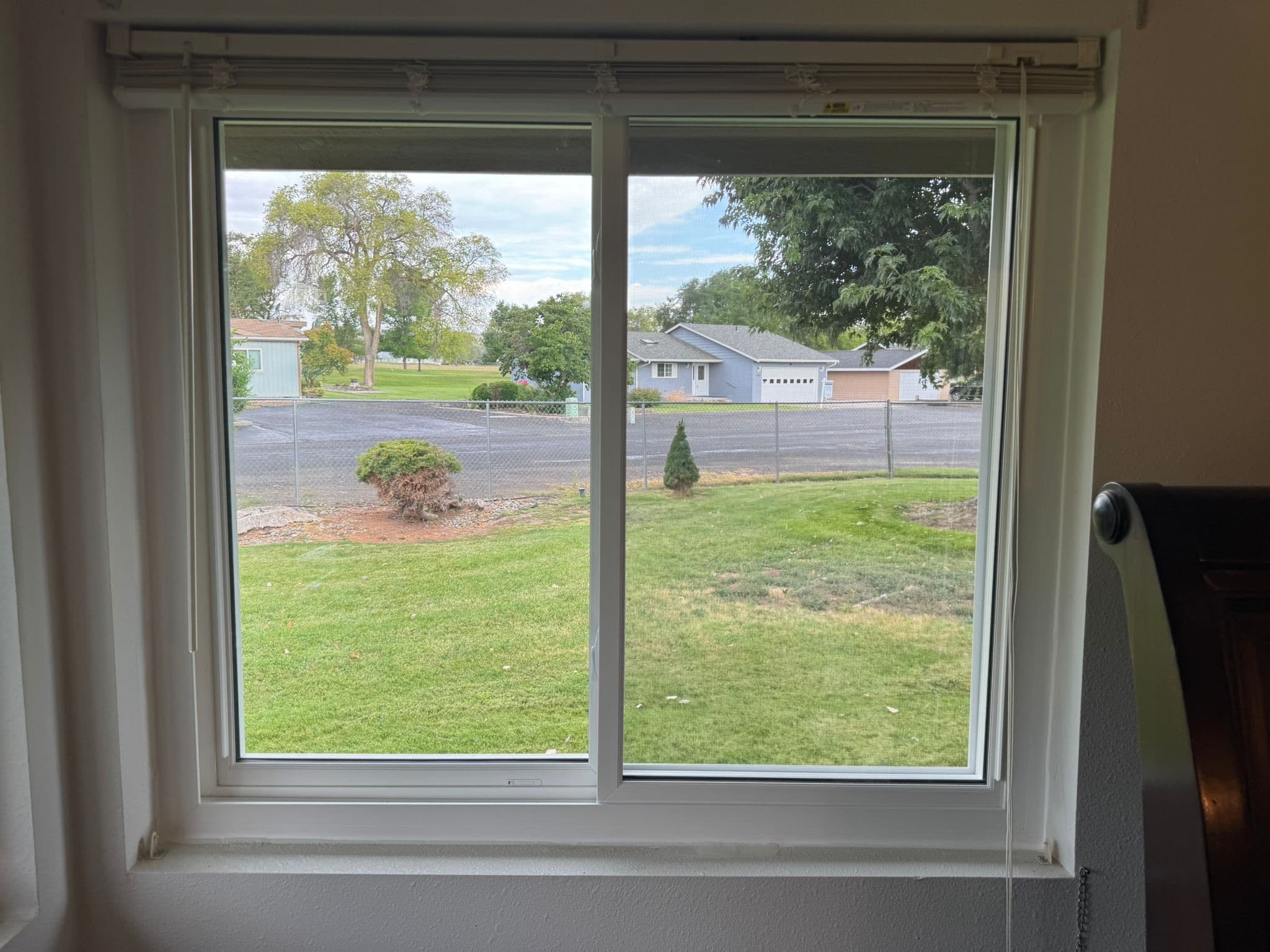 Interior view through new energy efficient replacement windows in a Tri-Cities home